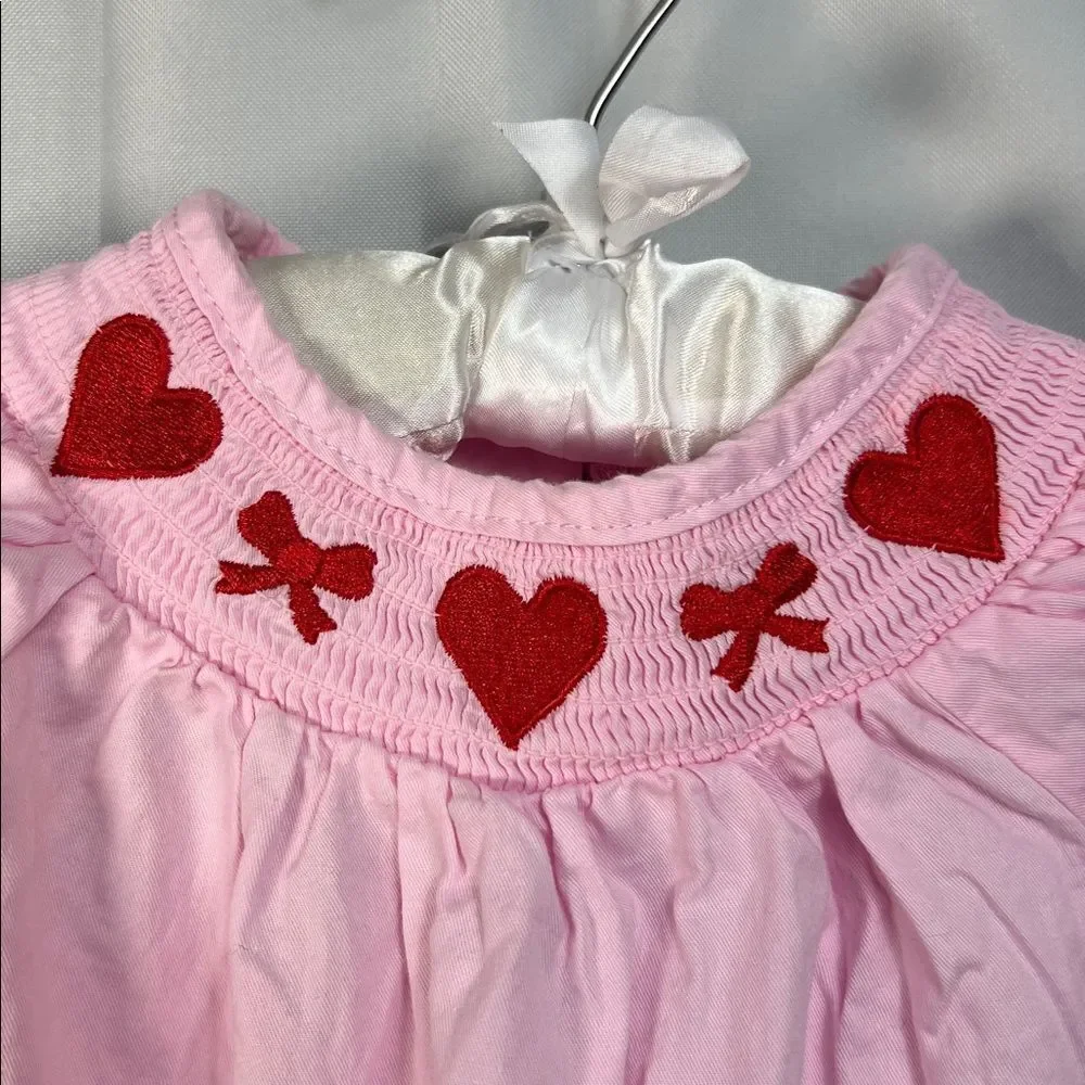 Boutique pink smocked bubble romper with hearts and bows embroidery size 3 month